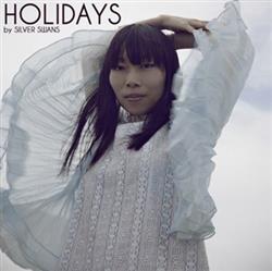 Download Silver Swans - Holidays